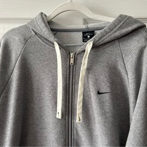 Nike woman's size Extra Large gray Dri fit zip up hooded sweatshirt.